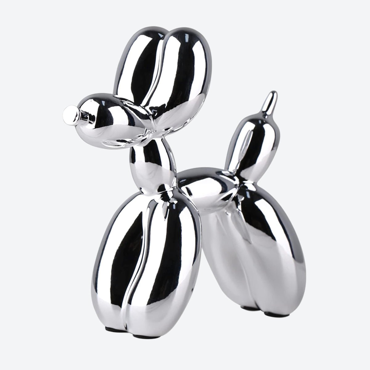 Modern metallic silver balloon dog ornament with a sleek reflective coating