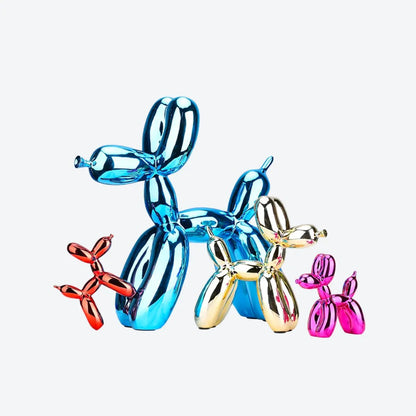 Assorted metallic balloon dog sculptures in blue, gold, pink, red, and silver displayed together in various sizes